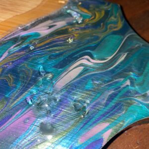 Bamboo and crystal with acrylic paint pour with art resin. Made in Lismore.