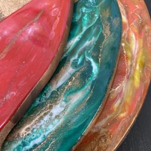 Made in Lismore art resin boards. Red, turquoise and orange plus gold and copper highlights