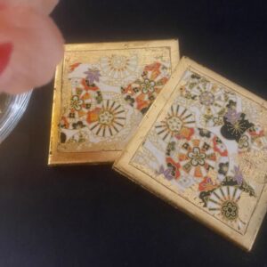 Tile coasters, Japanese origami paper, gilded edges.